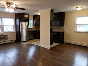 West Caldwell apartment for rent - an empty kitchen with wood floors and a refrigerator