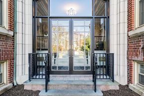 Bloomfield apartment for rent - the entrance of a building with glass doors