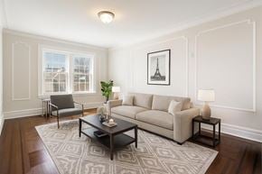 Bloomfield apartment for rent - A living room with a couch, chair, and coffee table.