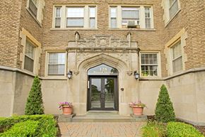 Bloomfield apartment for rent - the front of a building with a glass door