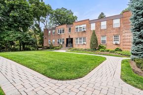 Montclair apartment for rent - a brick building with a lawn in front of it