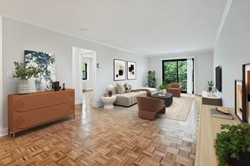 Hackensack apartment for rent - the living room has a hardwood floor and white walls