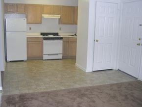 Wayne apartment for rent - an empty kitchen with a stove and a refrigerator