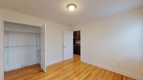 Belleville apartment for rent - a bedroom with a closet and a door to a bathroom