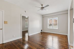 Cranford apartment for rent - A room with a ceiling fan and a window.