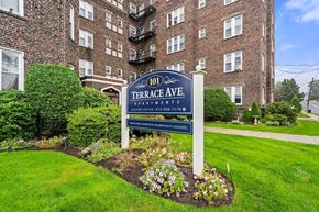 Hasbrouck Heights apartment for rent - our sign in front of our building in the yard
