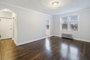 Hasbrouck Heights apartment for rent - an empty living room with hardwood flooring and a window