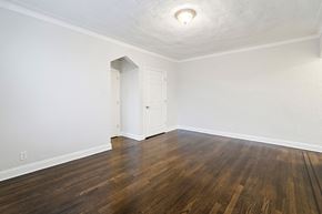 Hasbrouck Heights apartment for rent - an empty living room with wood flooring and white walls