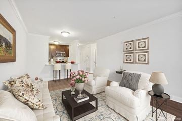 Livingston apartment for rent - a living room with white furniture and a kitchen in the background