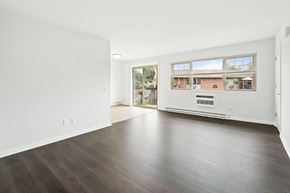 Lafayette apartment for rent - an empty living room with wood floors and a window
