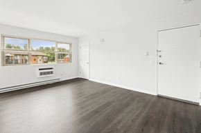 Lafayette apartment for rent - an empty living room with wood floors and a window