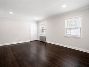 Little Falls apartment for rent - A room with a wooden floor and a window.