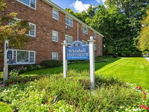 Montclair apartment for rent - a sign in front of a brick building