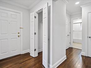 Montclair apartment for rent - a bedroom with white doors and a wood floor