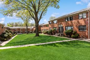 Iselin apartment for rent - our apartments are located in a quiet neighborhood with green grass