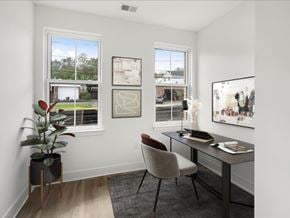 Madison apartment for rent - A room with a desk, chair, and pictures on the wall.