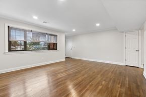 Metuchen apartment for rent - the living room is spacious and has a large window and hardwood floors