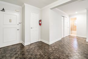 Caldwell apartment for rent - a living room with white walls and white doors
