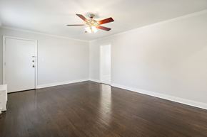 Caldwell apartment for rent - a empty room with white walls and a ceiling fan