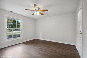 Frenchtown apartment for rent - an empty bedroom with a ceiling fan and a window