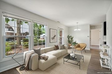 Frenchtown apartment for rent - a living room with a white couch and a coffee table
