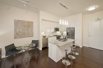 Chef inspired kitchen islands with chic pendant lighting