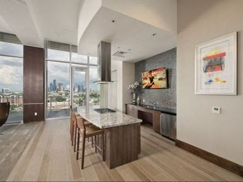 Gourmet kitchen with breakfast bar and pantry