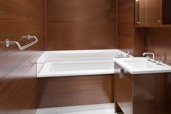 Bath tub in bathroom