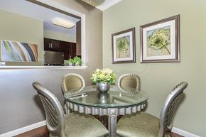 Middletown apartment for rent - a dining room with a glass table and chairs