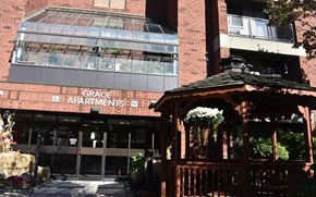 Providence apartment for rent - The front of the Grace Apartments building with a gazebo in front.