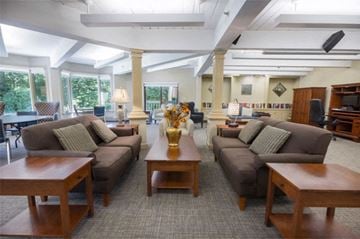 Hudson apartment for rent - a large living room with couches and tables