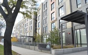 Chicago apartment for rent - A modern apartment building named The Burnham is shown in the image.