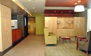 Chicago apartment for rent - A conference room with a green chair and a table.