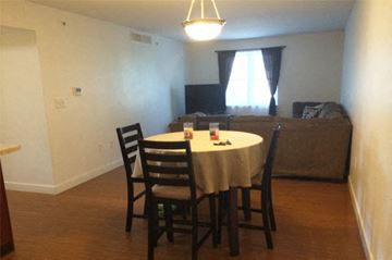 Weymouth apartment for rent - a living room with a dining table and a couch