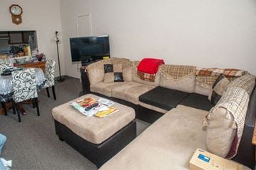 Framingham apartment for rent - a living room with two couches and a tv