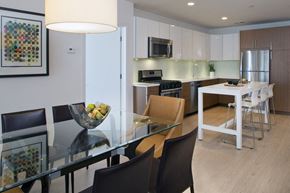 Haverstraw apartment for rent - a kitchen and dining room with a glass table and chairs
