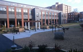 Hartford apartment for rent - a playground in front of a large building