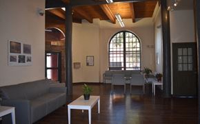 Hartford apartment for rent - the living room and dining area of a house with a large window