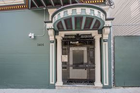 San Francisco apartment for rent - A green building with a white door and a sign that says 3605.