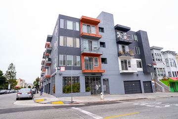 San Francisco apartment for rent - A modern multi-story building with balconies and a grey facade.