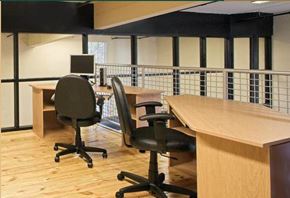 Petersburg apartment for rent - a conference room with desks and chairs and a computer