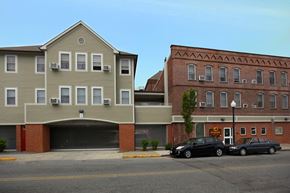 New Bedford apartment for rent - an apartment building and a parking garage on a city street