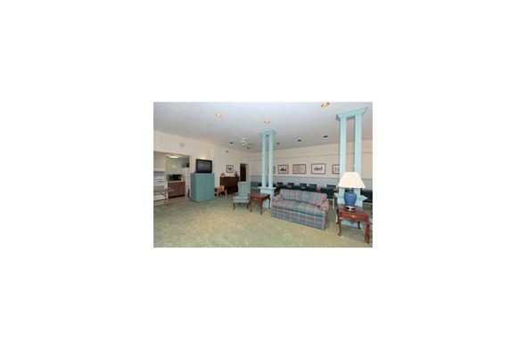 Gloucester apartment for rent - a view of a living room with a couch and a table