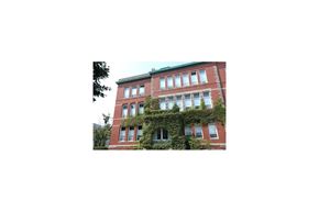 Gloucester apartment for rent - an old brick building with vines growing on it