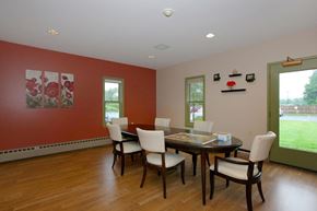 Easthampton apartment for rent - a dining room with a table and chairs