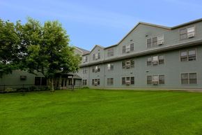 Easthampton apartment for rent - a large green lawn in front of an apartment building