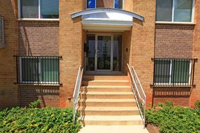 Washington apartment for rent - the entrance to a brick building with stairs