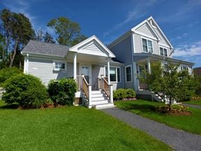 Chatham apartment for rent - a blue house with a sidewalk in front of it