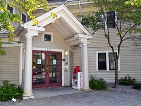 New Haven apartment for rent - the front of the building is shown with a red door
