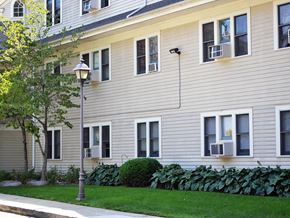 New Haven apartment for rent - a white house with a lamp post in front of it